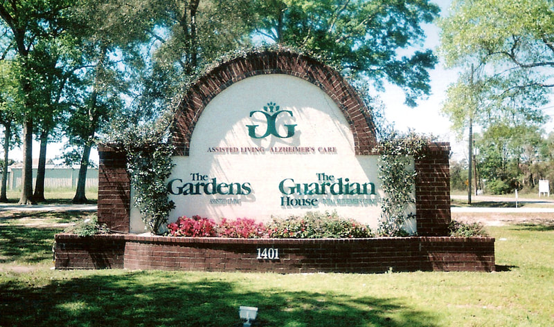 the gardens sign - brick and stucco monument sign with acrylic letters - commercial signs lake charles la - hebert signs
