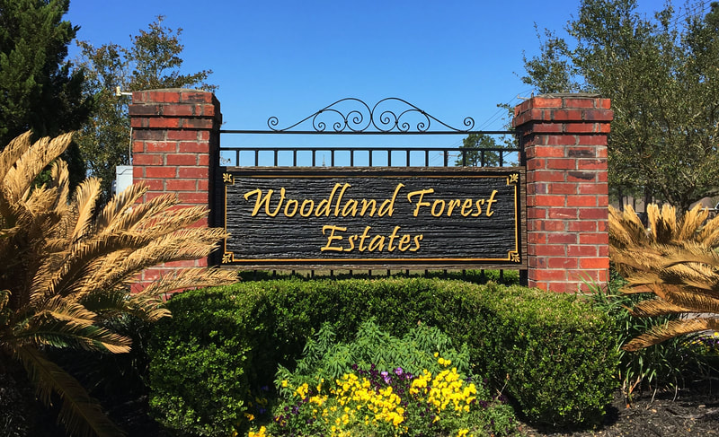 Woodland Forest sign - routed HDU with wroght iron and brick sign - lake charles la - hebert signs